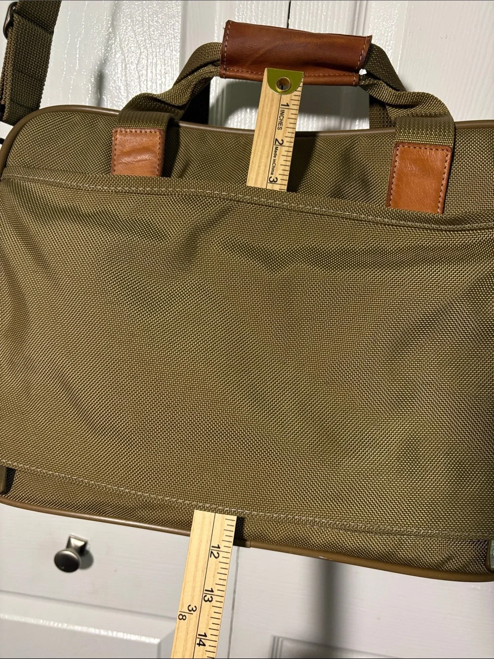 Hartmann nylon and leather  travel case with trolley sleeve.